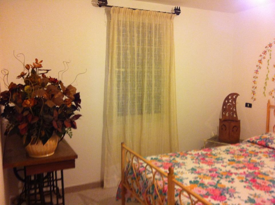 Bed And Breakfast Li Paduli Alvi Cannigione Habitación foto