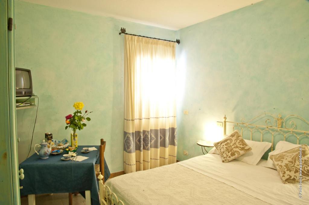 Bed And Breakfast Li Paduli Alvi Cannigione Exterior foto